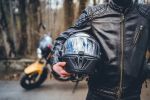 Motorcyclist with his helmet